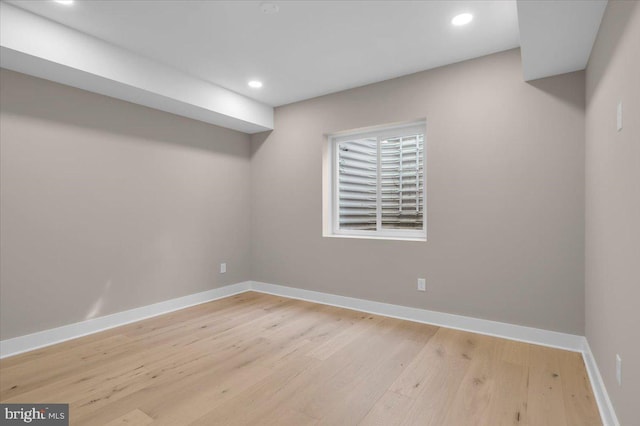 basement featuring light hardwood / wood-style floors