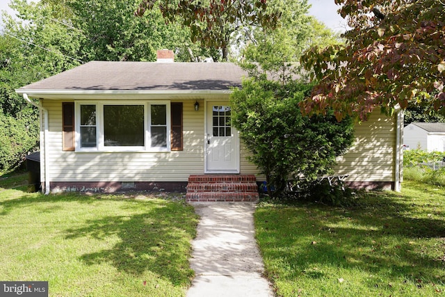 view of front of house with a front yard