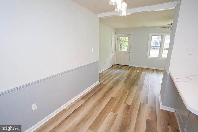 entryway featuring ceiling fan and light hardwood / wood-style floors