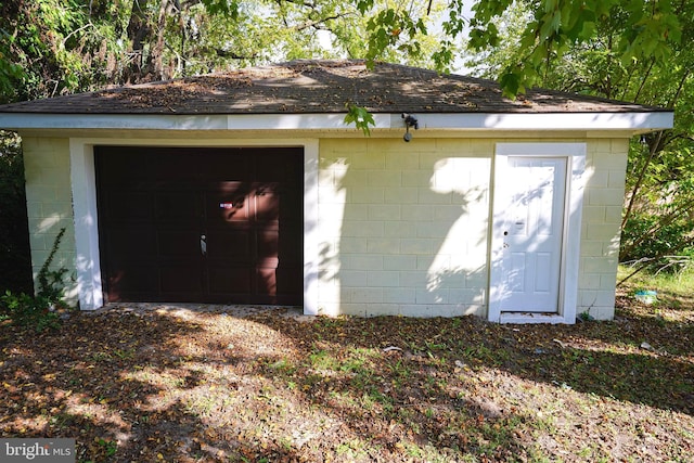 view of outdoor structure with a garage