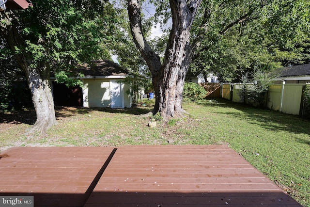 view of yard featuring a wooden deck