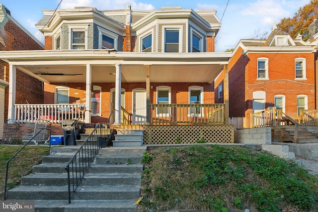 townhome / multi-family property with covered porch