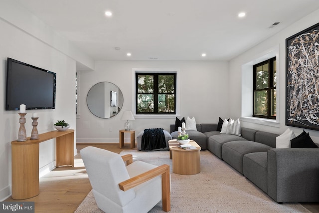 living room with light hardwood / wood-style floors