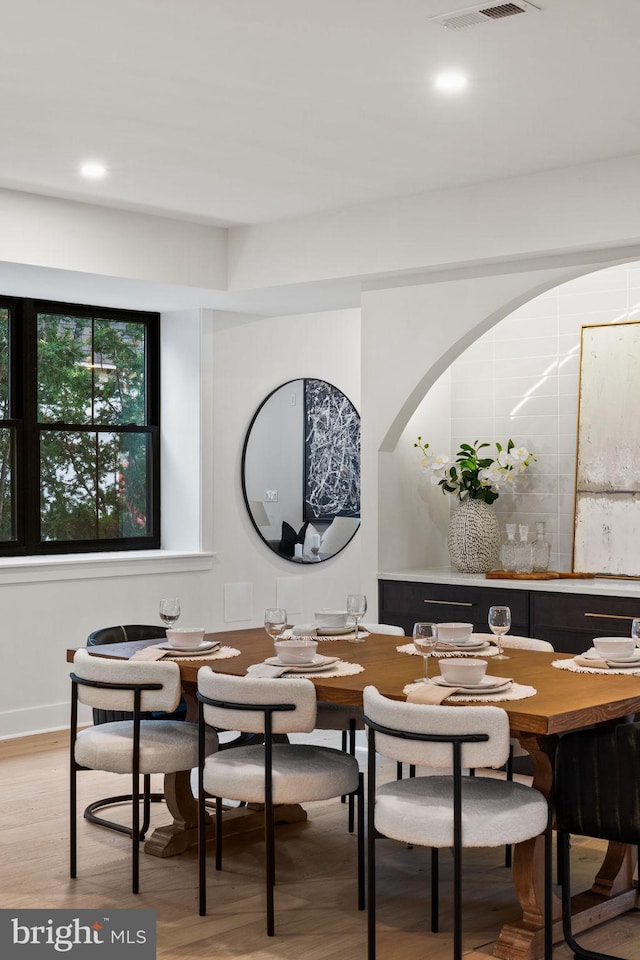 dining space featuring light hardwood / wood-style floors