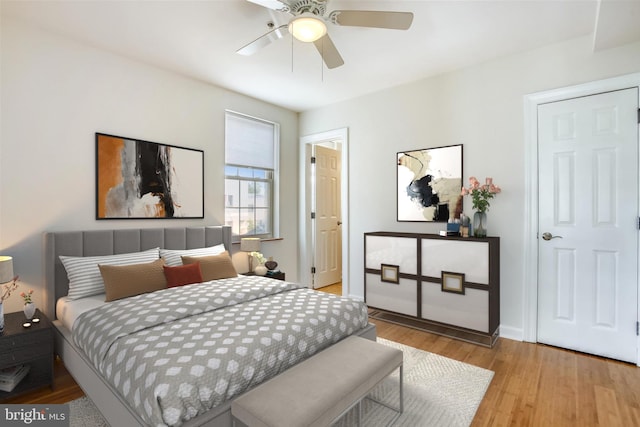 bedroom featuring ceiling fan and light wood-type flooring