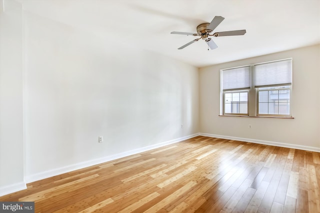 unfurnished room featuring light hardwood / wood-style floors and ceiling fan