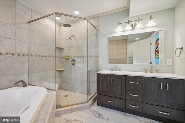 bathroom featuring vanity, independent shower and bath, and crown molding