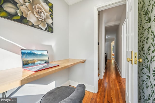 corridor featuring dark hardwood / wood-style floors