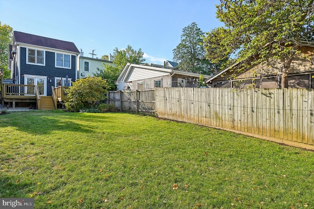 view of yard with a deck