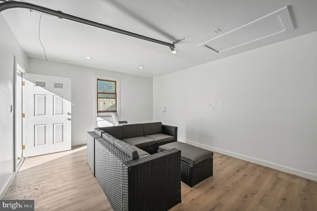 living room with light hardwood / wood-style floors