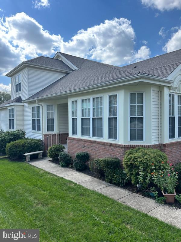 view of front of home with a front yard