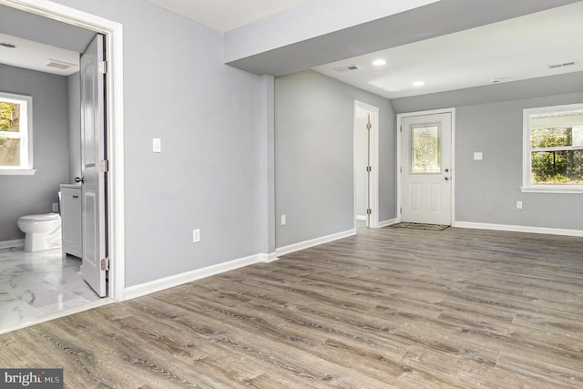 foyer featuring hardwood / wood-style flooring