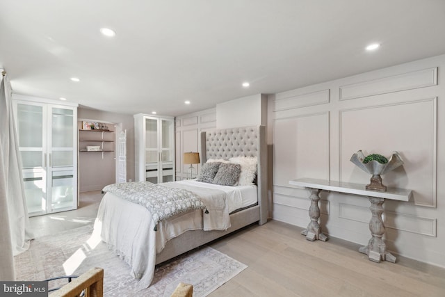 bedroom featuring light hardwood / wood-style flooring