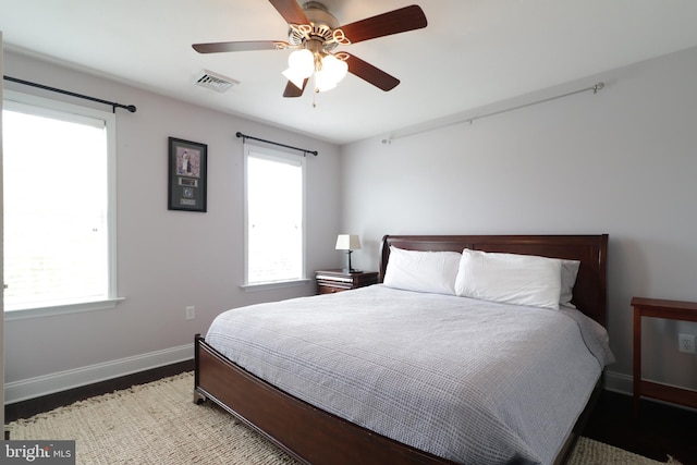 bedroom featuring hardwood / wood-style floors and ceiling fan