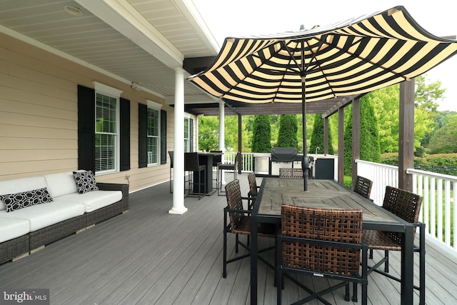 deck with an outdoor living space