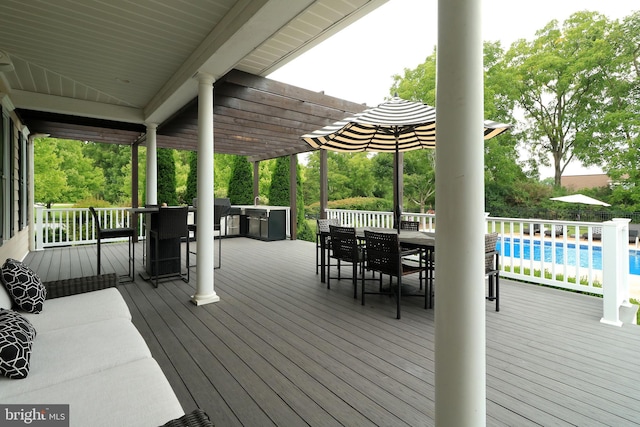 wooden deck featuring a pergola