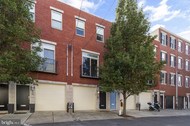 view of building exterior featuring a garage