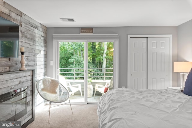 carpeted bedroom with a closet