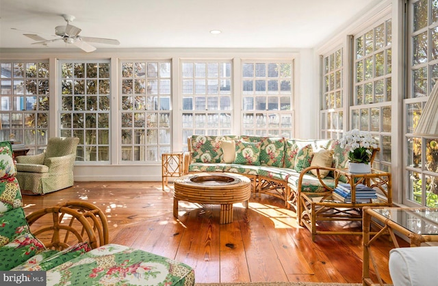 sunroom featuring plenty of natural light and ceiling fan