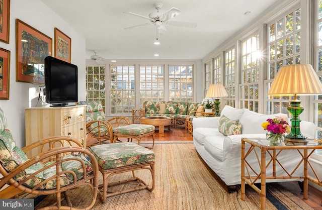 sunroom / solarium with ceiling fan