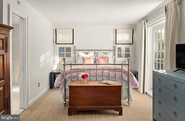 69 Henlopen Ave, Rehoboth Beach, DE 19971 - bedroom with carpet flooring, access to outside, and baseboards