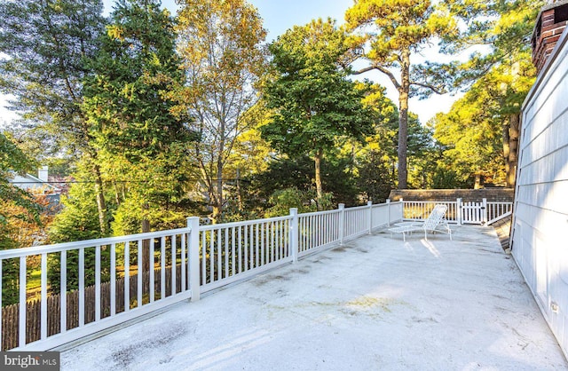 69 Henlopen Ave, Rehoboth Beach, DE 19971 - view of patio / terrace with view of wooded area
