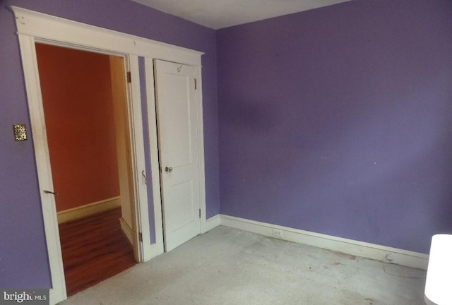 unfurnished bedroom with light wood-type flooring