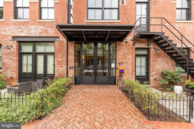 entrance to property featuring french doors