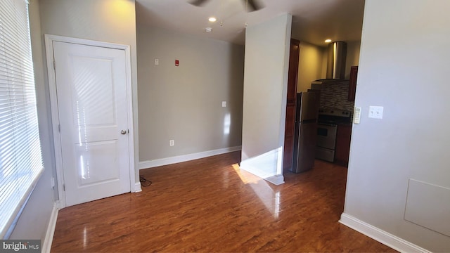 interior space with dark hardwood / wood-style floors