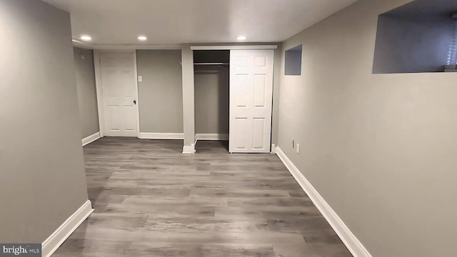 unfurnished bedroom with wood-type flooring