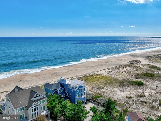 bird's eye view with a beach view and a water view