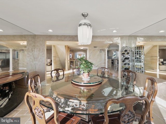 40110 Owens Ct, Fenwick Island, DE 19944 - dining space featuring arched walkways and recessed lighting