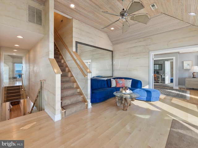 living area featuring wood ceiling, high vaulted ceiling, hardwood / wood-style flooring, and ceiling fan