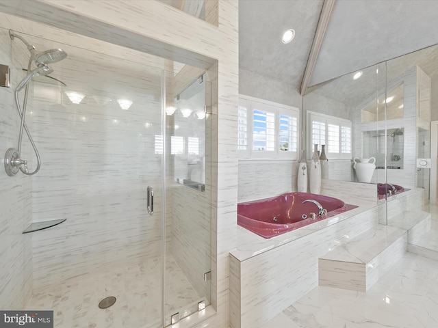 bathroom with separate shower and tub and lofted ceiling