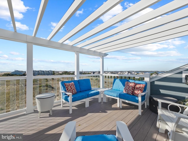 wooden deck with an outdoor living space and a pergola