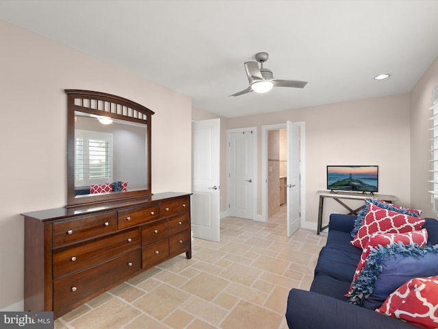 living room featuring ceiling fan