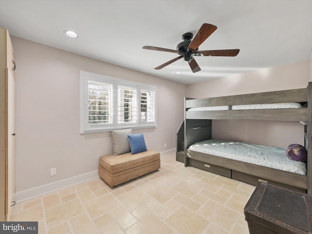 40110 Owens Ct, Fenwick Island, DE 19944 - bedroom featuring baseboards, recessed lighting, stone finish floor, and a ceiling fan