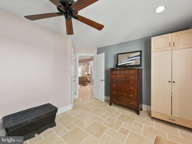 interior space with a closet and ceiling fan