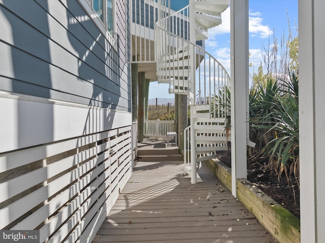 40110 Owens Ct, Fenwick Island, DE 19944 - view of property exterior featuring a wooden deck and stairs