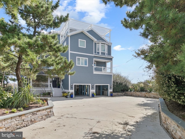 40110 Owens Ct, Fenwick Island, DE 19944 - back of house with concrete driveway
