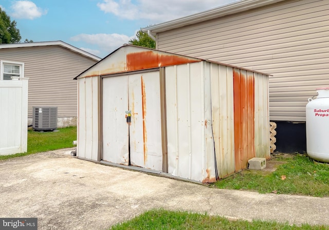 view of outdoor structure with central AC