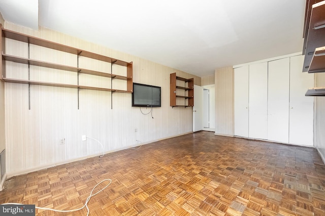 interior space featuring parquet flooring