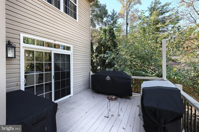 wooden terrace with grilling area