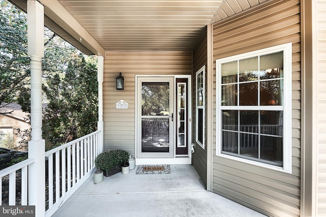 entrance to property with covered porch