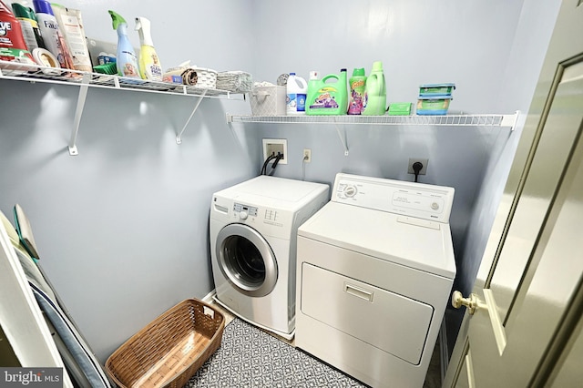 laundry room featuring washer and dryer