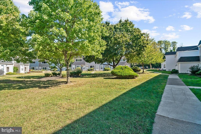 view of yard with a residential view