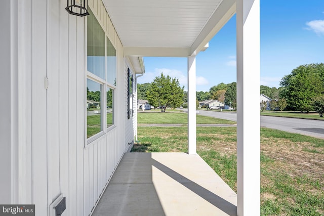 view of patio featuring a porch