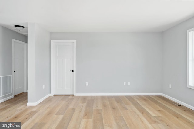 empty room with light wood-type flooring