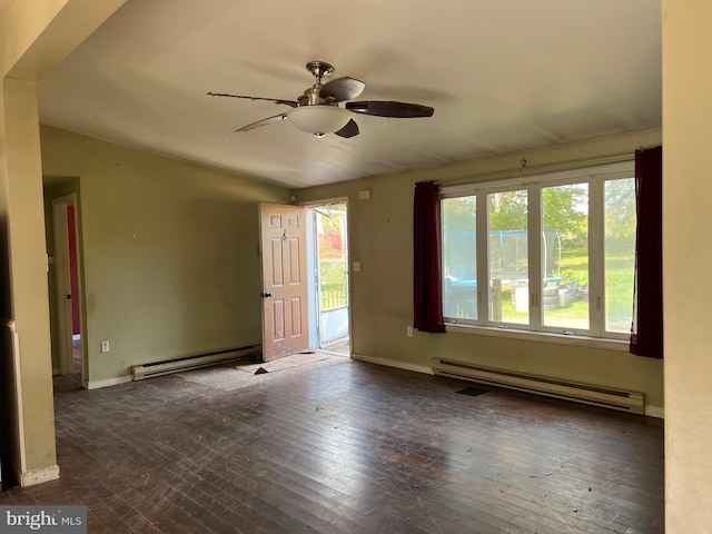 spare room featuring ceiling fan, dark hardwood / wood-style floors, lofted ceiling, and baseboard heating