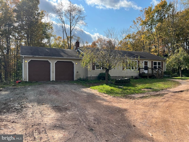 single story home with a garage